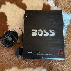 Boss Riot R3002 Black Amplifier with Silver Logo and Red Accent